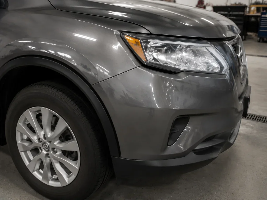 Same corner after repair: restored fitment, gaps, contour, and refinished blend