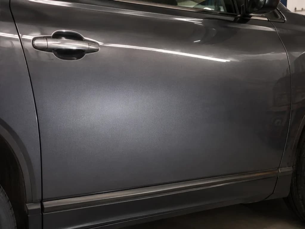 Same panel after PDR with factory paint preserved